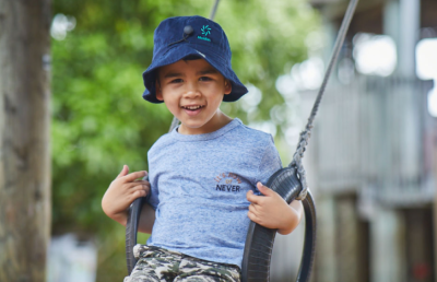 Kid on swing