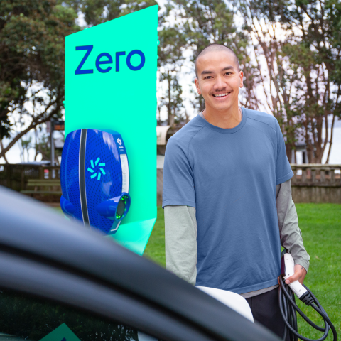 A man next to a Zero AC charger