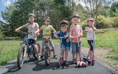 Kids on bikes and scooters