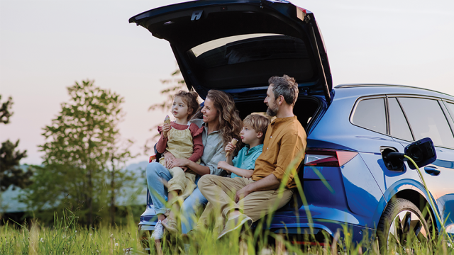 Family with ev outdoors