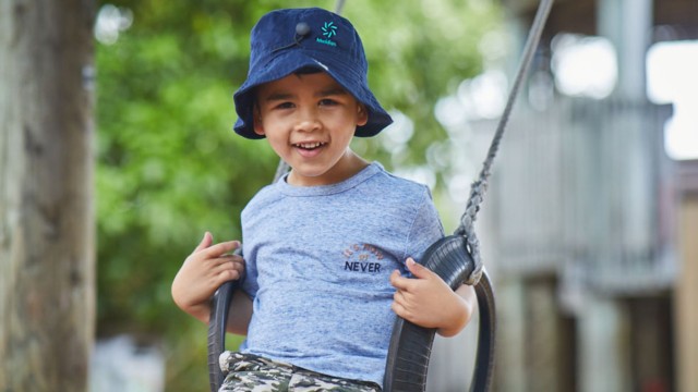 Kid on a swing